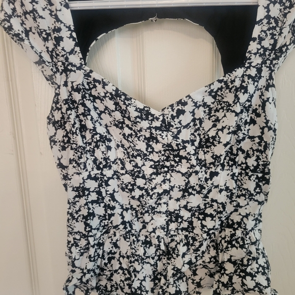 Dynamite Peplum Black and White Summer Top with back cutout - Picture 2 of 6